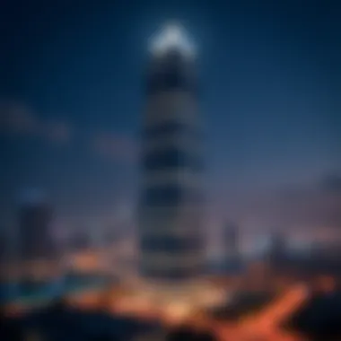 Al Manal Tower Illuminated at Night Night view highlighting the Al Manal Tower amidst the vibrant city lights
